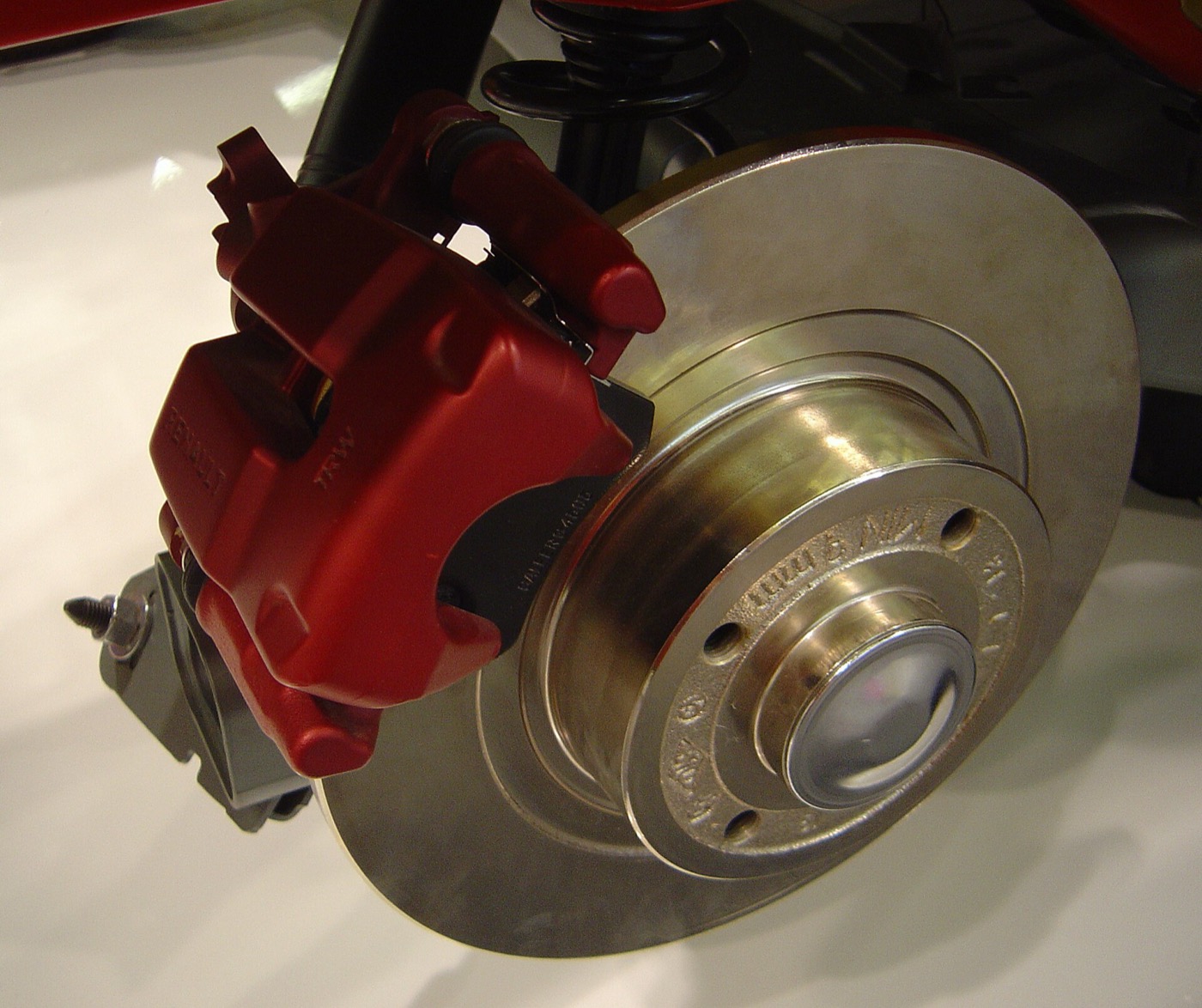 A brake disc with its red caliper